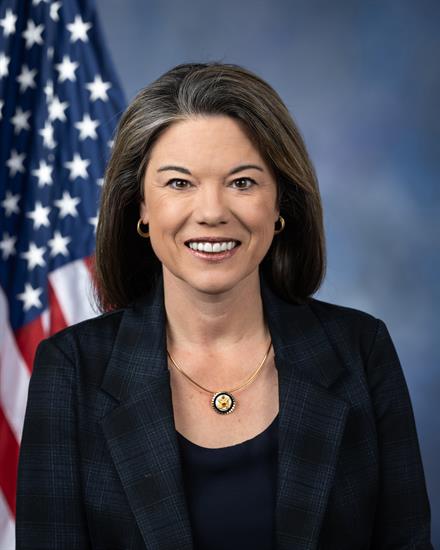 Ranking Member Angie Craig of Minnesota smiles in her official portrait.